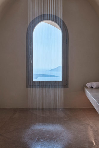 A separate bathroom with steam/hammam bath.